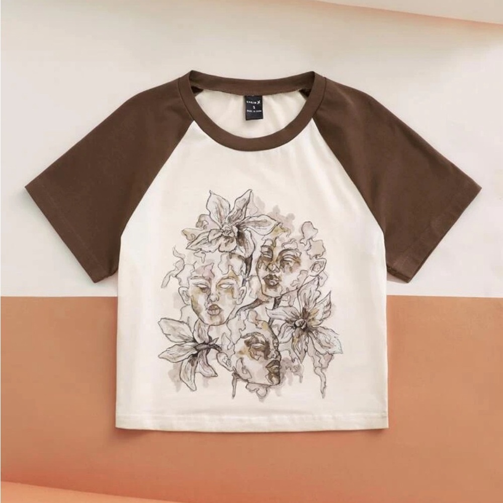 Brown and cream cropped baby tee with face design large
